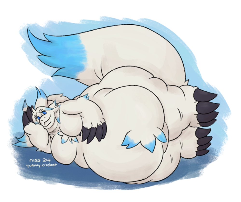 a very fat white and blue fuzzy dragon laying on his side